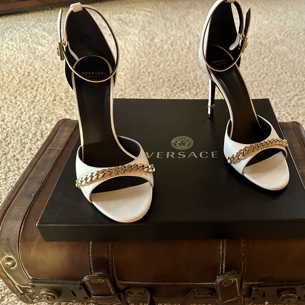 Versace white 4” stiletto heel. Size 39. The Medusa head is on the strap buckle